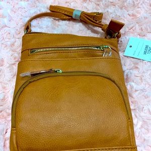 Non brand new satchel purse. Never used orange purse.